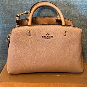 Coach Taupe crossbody for everyday wear and formal. Goes with every outfit!